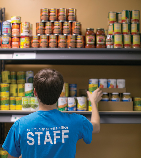 Student working in a food bank